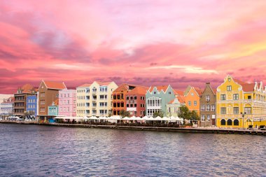 Sunset sky above Curacao downtown clipart