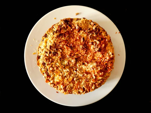 stock image Top view of a homemade Crushed Almond and Honey Cake straight out of the oven