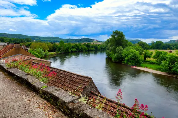 stock image View of the River Dordogne flowing through the landscape as seen from Beynac et Cazenac a fortified town in the Dordogne, France