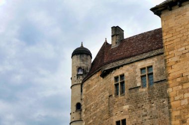 A tower of Chateau de Beynac located in Beynac et Cazenac a fortified town in the Dordogne, France clipart