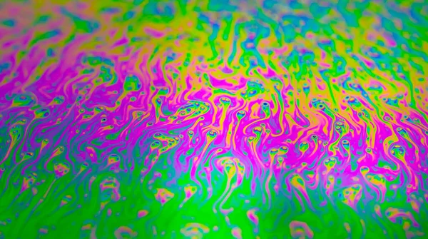 stock image Photo of iridescent surface of soapy water. Space abstract colorful background for your screensaver. High quality photo