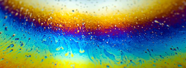 虹色の多色の明るい抽象的な石鹸水の背景 スクリーンセーバーのスペースの背景 高品質の写真 — ストック写真
