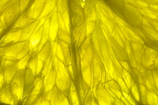 Portakal diliminin yakın çekimi. Yapısal, soyut meyve arkaplanı. Yüksek kalite fotoğraf