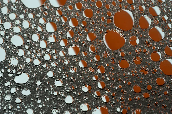 テラコッタ色の抽象的な質感の背景 石鹸水の中の油の円 高品質の写真 — ストック写真