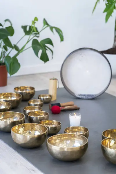 Tibetan singing bowls on the floor in a yoga studio. High quality photo