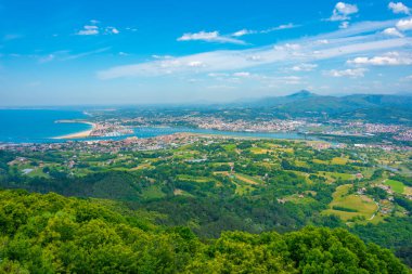 Panorama view of Irun and Hendaye towns at border between Spain and France. clipart