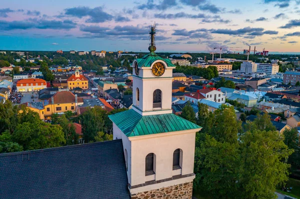 stock image Sunset panorama of the holy cross church and Finnish town Rauma.