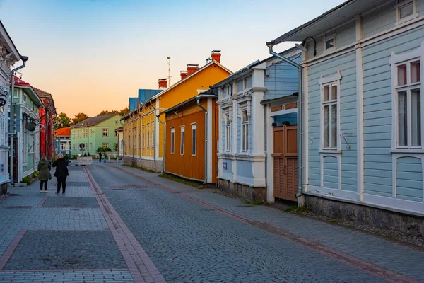 stock image Sunset view of timber buildings at Vanha Rauma district of Rauma in Finland.