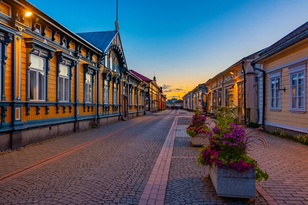 stock image Sunset view of timber buildings at Vanha Rauma district of Rauma in Finland.