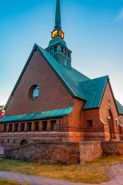 stock image Sunset view of Saint George church in Finnish town Mariehamn.