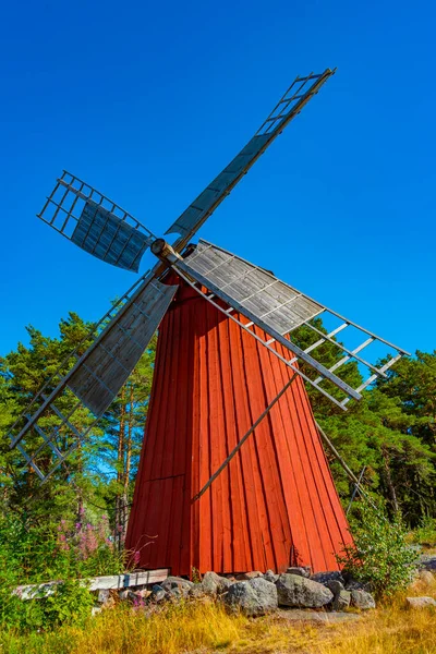 Red windmill at Open-air Museum Jan Karlsgarden at Kastelholm at Aland islands in Finland.