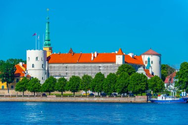 View of the Riga castle from the other side of the Daugava river, Latvia..