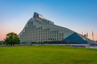 Sunset view of the Latvian national library in Riga, Latvia.. clipart