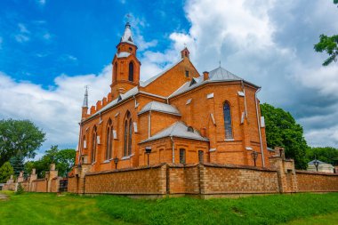 View of a red church in Kernave, Lithuania. clipart