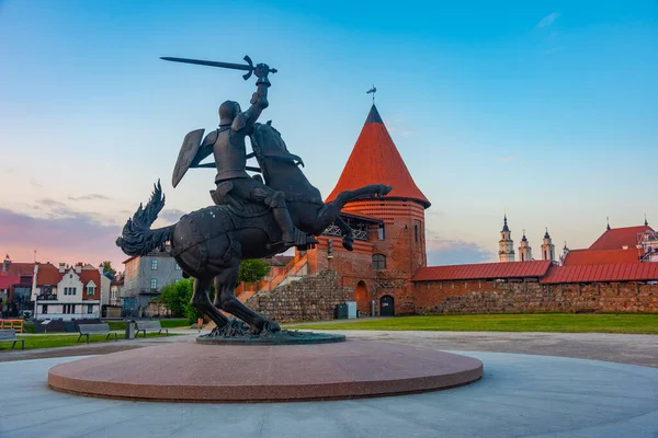 stock image Sunrise view of Vytis Monument and the castle in Kaunas, Lithuania.