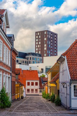 Colorful street in the center of Odense, Denmark. clipart