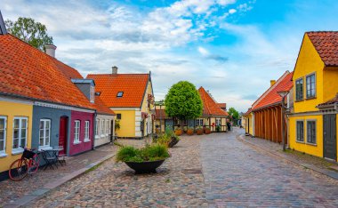 Colorful street in the center of Odense, Denmark. clipart