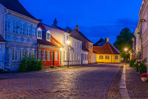 stock image Night view of a colorful street in the center of Odense, Denmark.