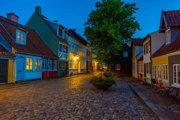 stock image Night view of a colorful street in the center of Odense, Denmark.