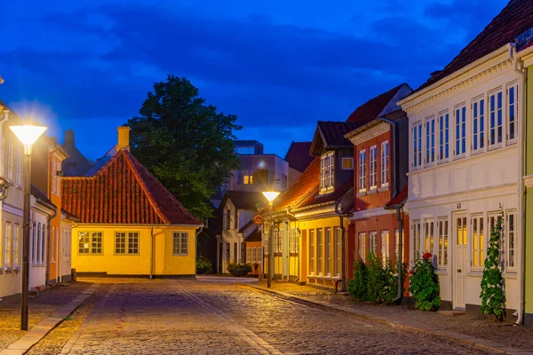 stock image Night view of a colorful street in the center of Odense, Denmark.