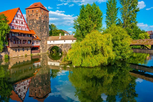 stock image Historical old town with view of Weinstadel building, water tower, Henkerbrucke bridge and Henkerturm tower in Nurnberg, Germany..