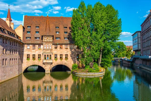 stock image Ancient Nurnberg Heilig Geist Spital building (Hospital of the Holy Ghost) in Nurnberg, Germany..