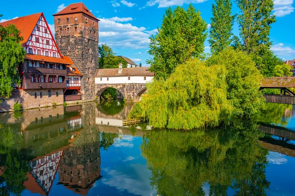 stock image Historical old town with view of Weinstadel building, water tower, Henkerbrucke bridge and Henkerturm tower in Nurnberg, Germany..