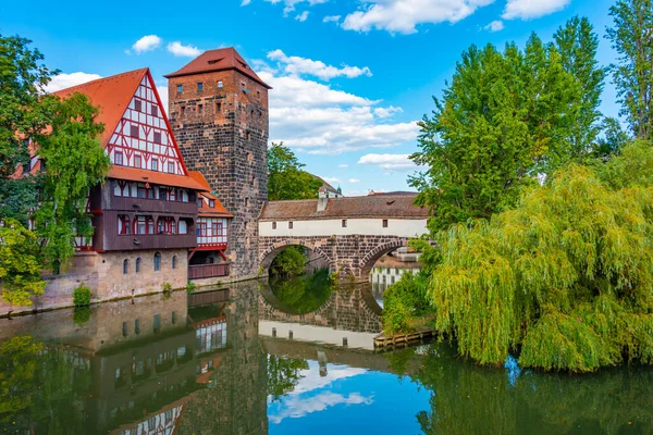 stock image Historical old town with view of Weinstadel building, water tower, Henkerbrucke bridge and Henkerturm tower in Nurnberg, Germany..