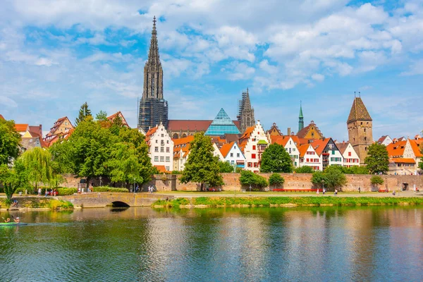 stock image Cityscape of German town Ulm reflecting on river Danube.