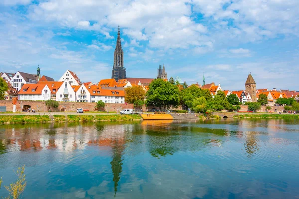 stock image Cityscape of German town Ulm reflecting on river Danube.