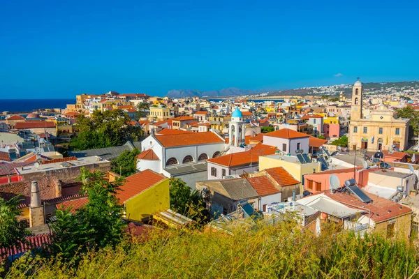 stock image Sunset view of rooftops of Greek town Chania at Crete island.