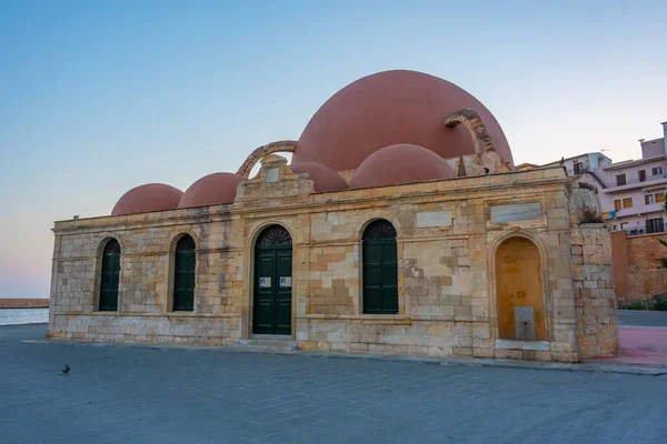 stock image Sunrise view of the Mosque of the Janissaries represents a Landmark of Chania, Crete.