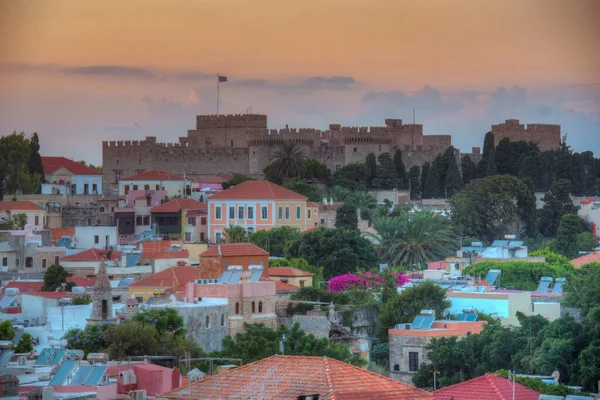 stock image Sunset panorama view of Palace of the Grand Master of the Knights of Rhodes in Greece.