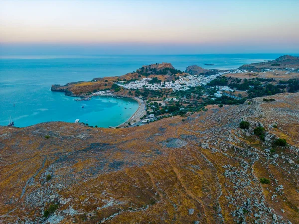 stock image Sunset panorama of Greek town Lindos at Rhodes island.