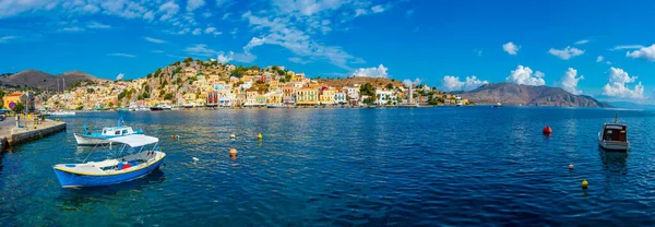 stock image Colourful houses at waterfront of Greek island Symi.