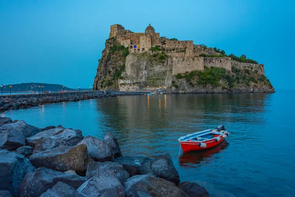 stock image Sunset view of Castello Aragonese off the coast of Italian island Ischia.