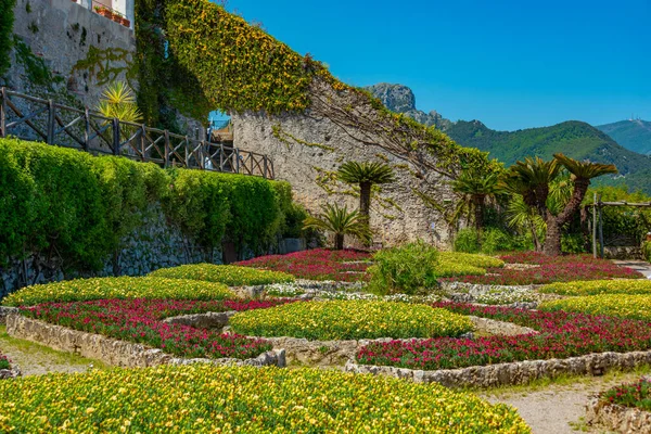 Colorful, symmetrical garden at Villa Rufolo in Ravello, Italy.