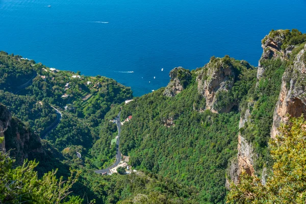 Natural landscape of Costiera Amalfitana coastline viewed from Sentiero degli Dei hiking trail in Italy.