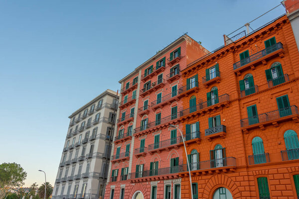 Colorful facades at seaside promenade in the Italian city Naples.