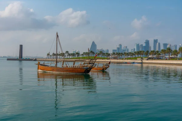 stock image Traditional dhows with skyline of Doha in Qatar.