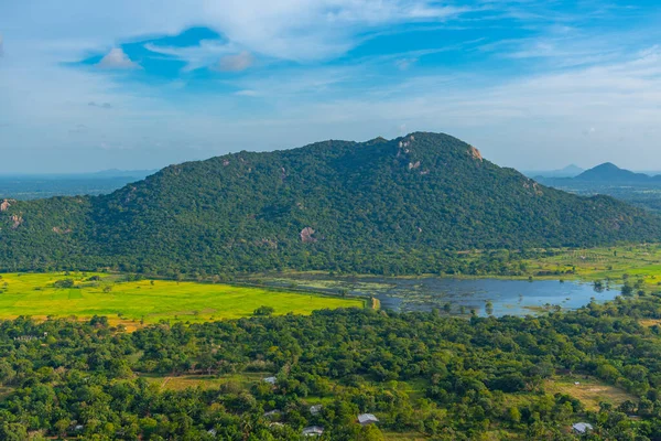 stock image Aerial view of green landscape near Mihintale mountain in Sri Lanka.