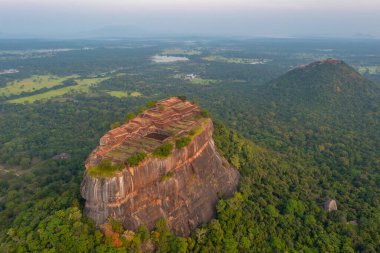 Sunrise aerial view of Sigiriya rock fortress in Sri Lanka. clipart