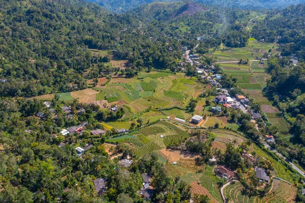 stock image Hilly landscape of Sri Lanka dotted with villages and tea plantations near Ella.