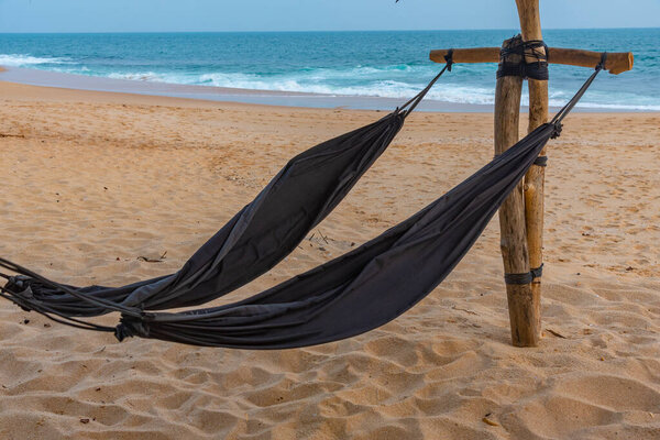 Hammocks at Marakolliya beach, Sri Lanka.