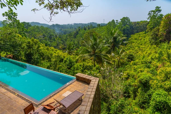 stock image Pool overlooking cinnamon fields at Mirissa Hills, Sri Lanka.