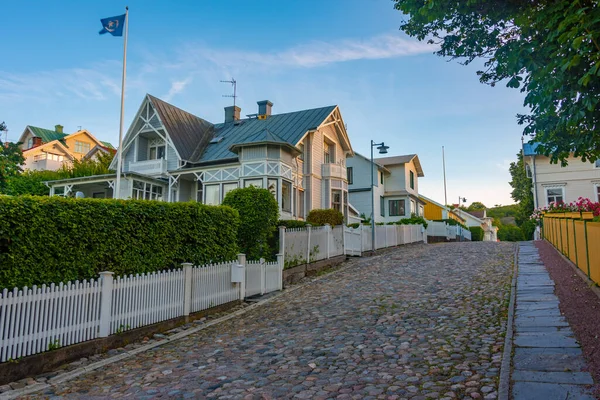 stock image Sunset view of a historical street in Marstrand, Sweden.