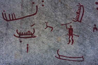 İsveç 'in Vitlycke yakınlarındaki Bronz Çağı kaya resimleri.