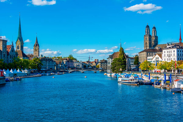 Panoramic view of historic city center of Zuerich with famous Fraumuenster and Grossmuenster Churches and river Limmat ,Switzerland.