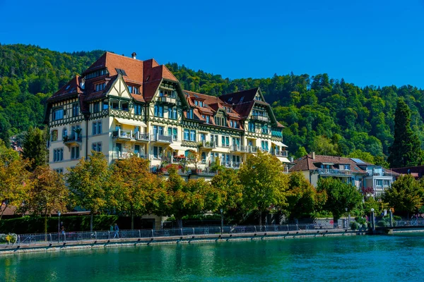 stock image Colorful houses at riverside of Aare river in Thun Switzerland.