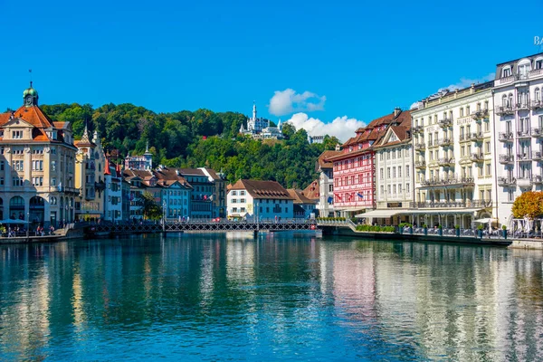 stock image Luzern, Switzerland, September 20, 2022: Hotels on waterfront of Reuss at Swiss town Luzern.